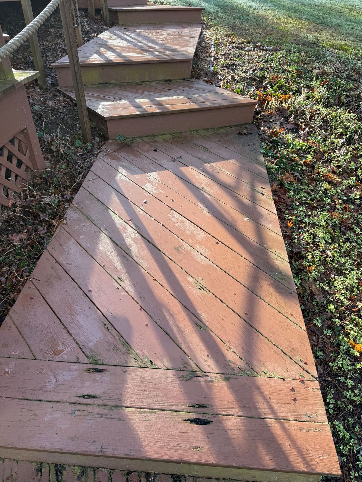 Weathered walkway and steps prior to replacement