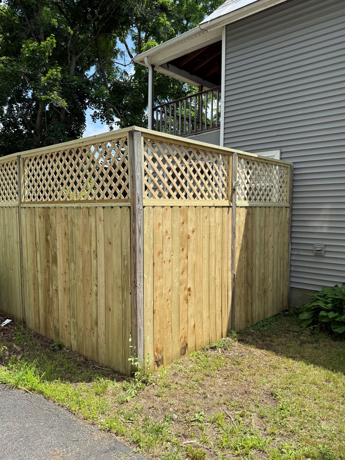 Wood privacy fence with lattice top