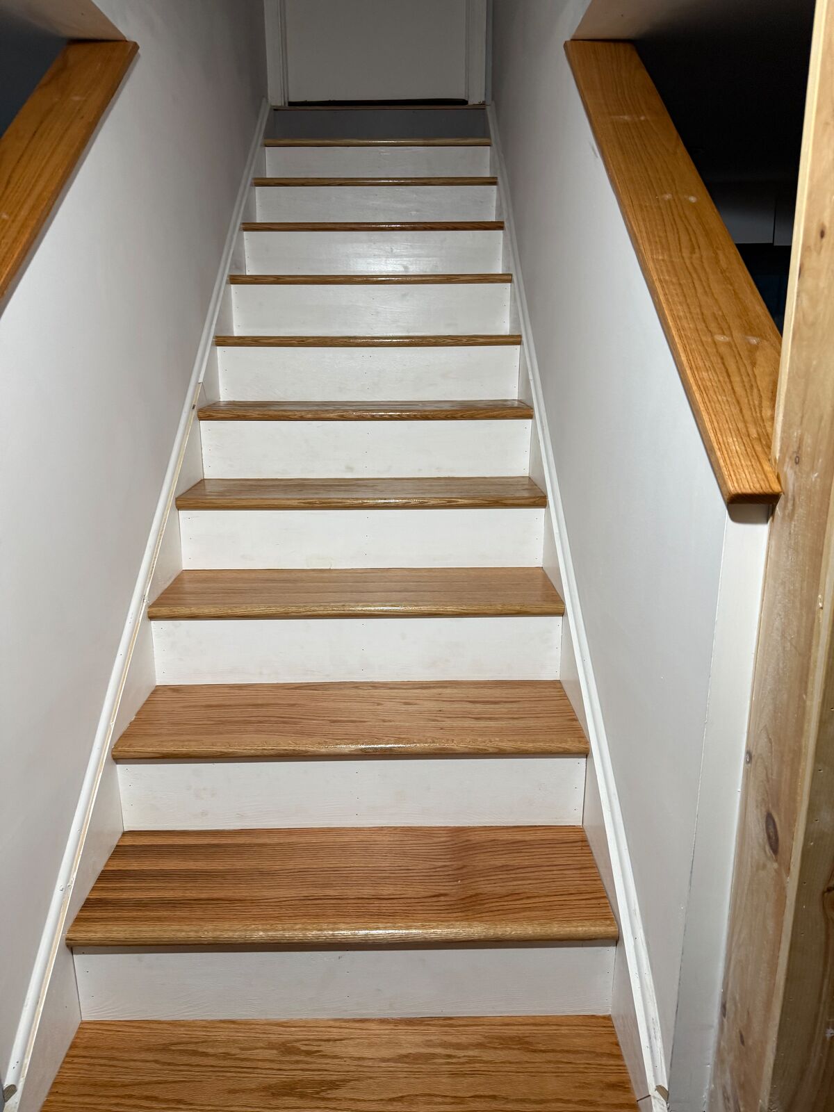 Stairway with oak treads and white risers