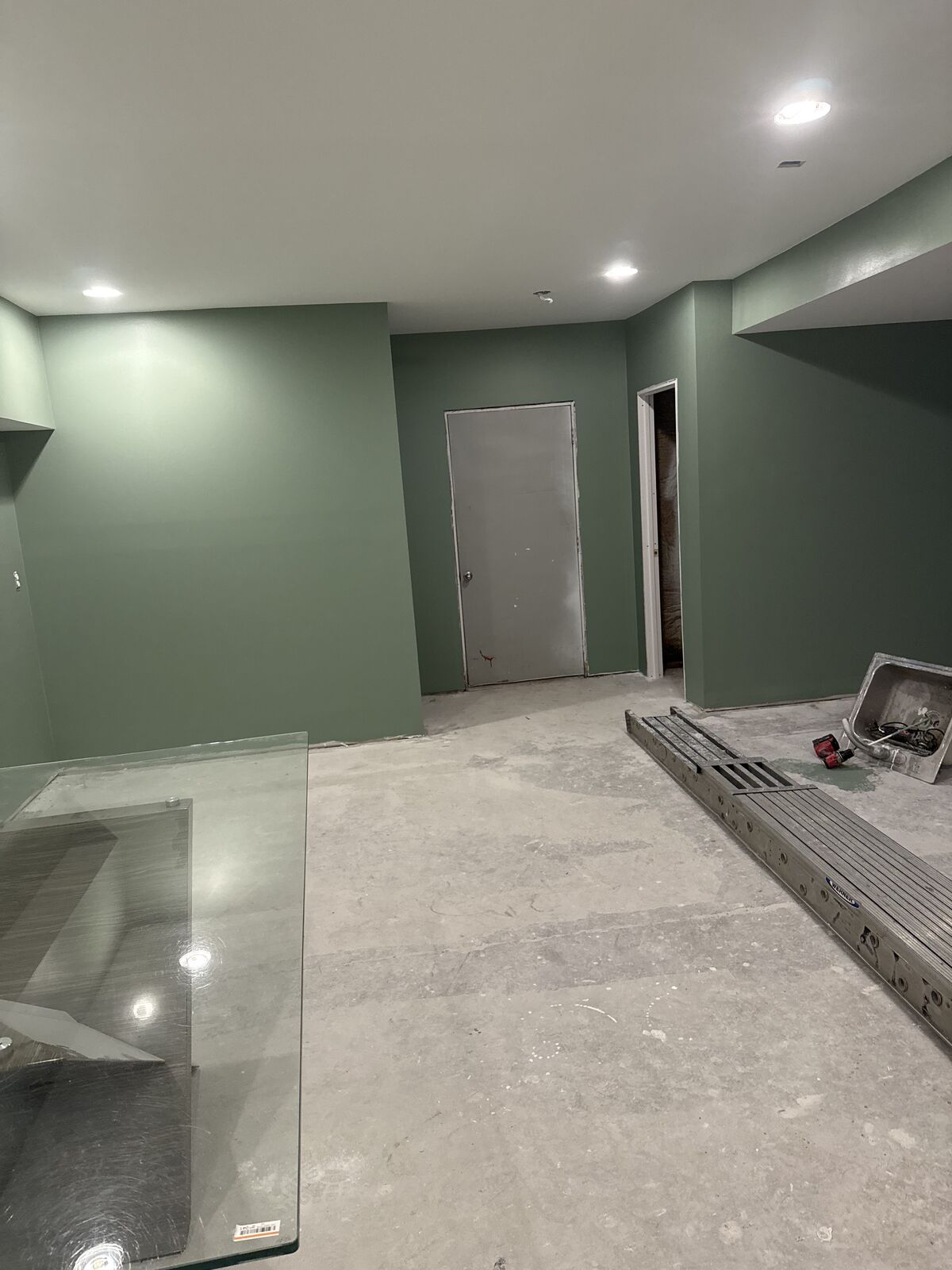 Basement walls painted sage green